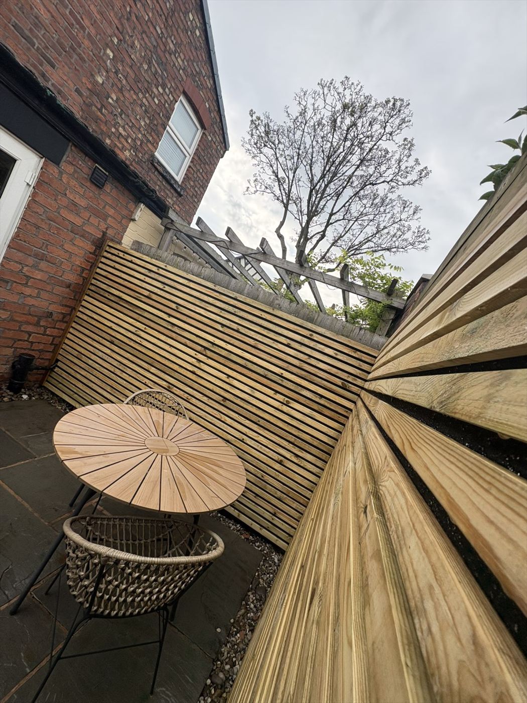 Slatted fence and new timber decking boards built by AJ Garden Services in Liverpool